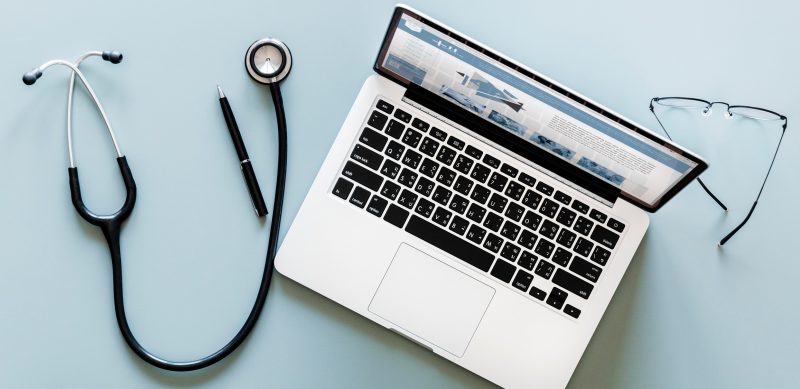 laptop and doctor's stethoscope
