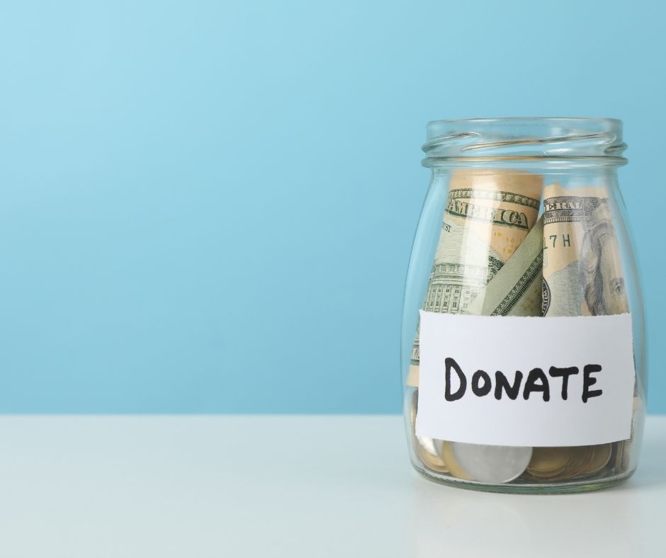 Donation jar with cash