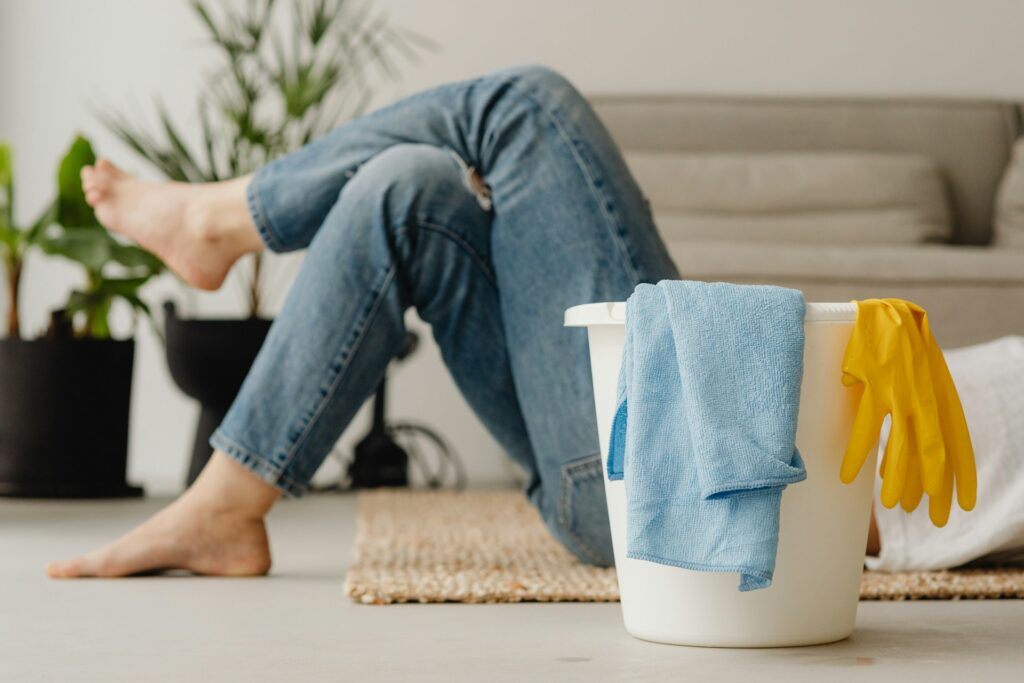 woman relaxing in a nice home after spring cleaning her finances